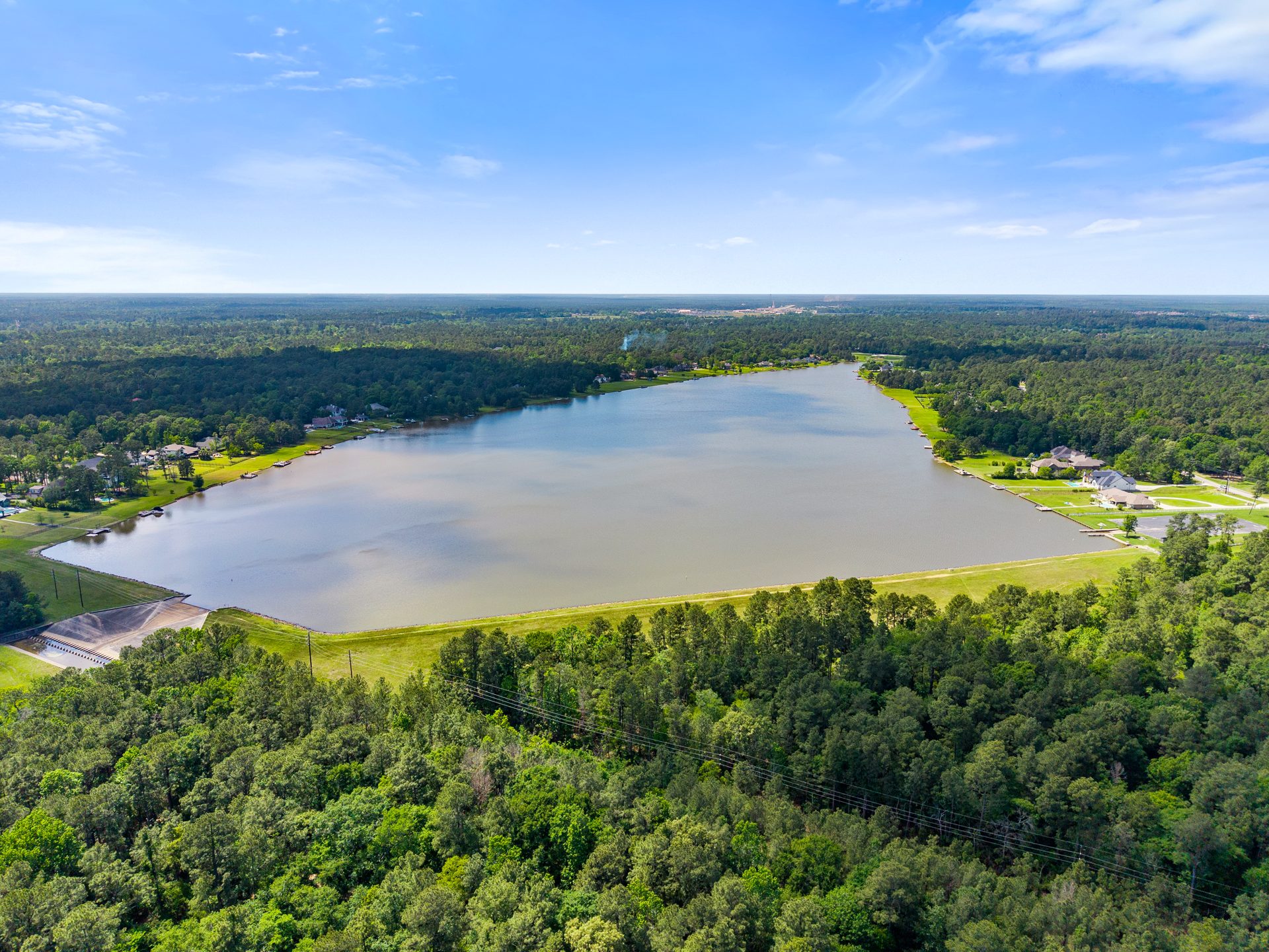 Manicured golf course fairway winding beside water
